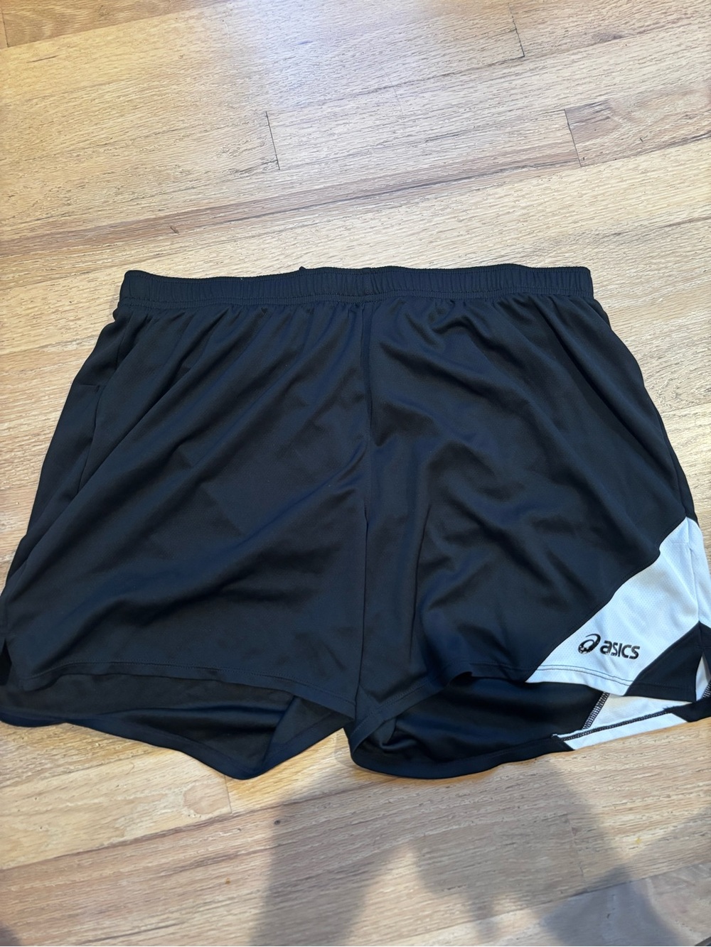 ASICS women’s Black Athletic Running Shorts with White Accent